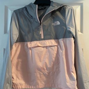 The North Face girls 1/4 zip pull over rain jacket.